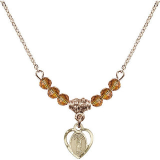 18" Hamilton Gold Plated Necklace with 4mm Topaz Crystal Beads featuring a 14kt Gold Filled Our Lady of Guadalupe Medal.