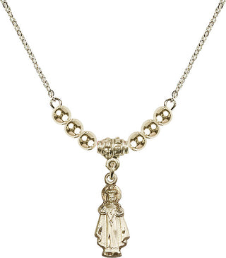 18" Hamilton Gold Plated Necklace with 4mm 14kt Gold Filled Beads featuring a 14kt Gold Filled Infant of Prague Medal.