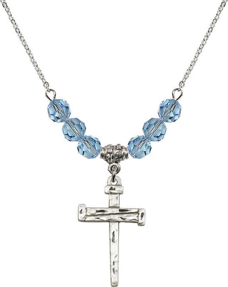 18" Rhodium Plated Necklace with 4mm Aqua Crystal Beads featuring a Sterling Silver Nail Cross Medal.