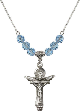 18" Rhodium Plated Necklace with 4mm Aqua Crystal Beads featuring a Sterling Silver Trinity Crucifix Medal.