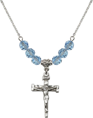 18" Rhodium Plated Necklace with 4mm Aqua Crystal Beads featuring a Sterling Silver Nail Crucifix Medal.