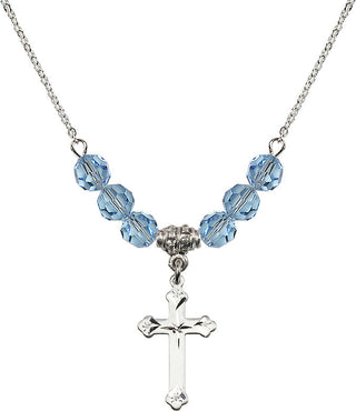 18" Rhodium Plated Necklace with 4mm Aqua Crystal Beads featuring a Sterling Silver Cross Medal.