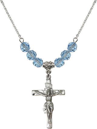 18" Rhodium Plated Necklace with 4mm Aqua Crystal Beads featuring a Sterling Silver Crucifix Medal.