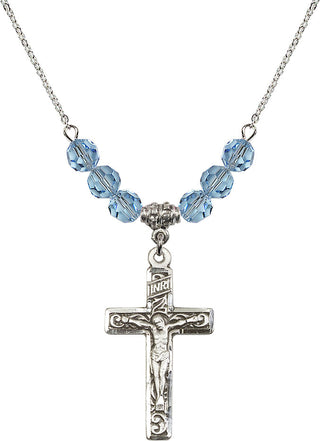 18" Rhodium Plated Necklace with 4mm Aqua Crystal Beads featuring a Sterling Silver Crucifix Medal.