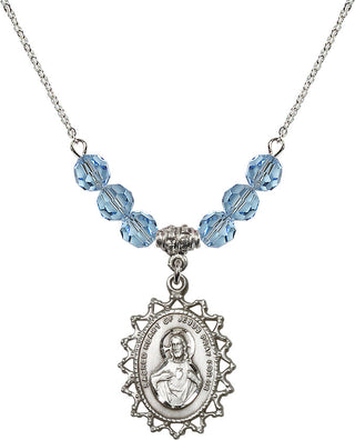 18" Rhodium Plated Necklace with 4mm Aqua Crystal Beads featuring a Sterling Silver Scapular Medal.