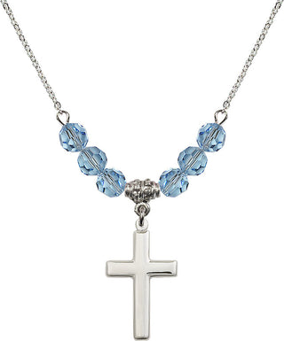 18" Rhodium Plated Necklace with 4mm Aqua Crystal Beads featuring a Sterling Silver Cross Medal.