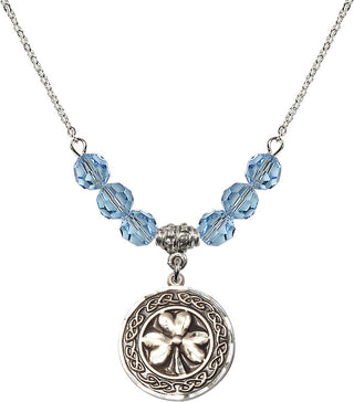 18" Rhodium Plated Necklace with 4mm Aqua Crystal Beads featuring a Sterling Silver Shamrock with Celtic Border Medal.