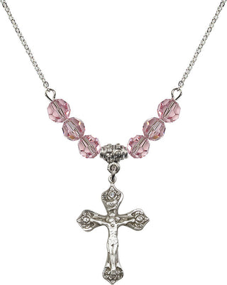 18" Rhodium Plated Necklace with 4mm Light Rose Crystal Beads featuring a Sterling Silver Crucifix Medal.