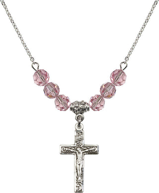 18" Rhodium Plated Necklace with 4mm Light Rose Crystal Beads featuring a Sterling Silver Crucifix Medal.