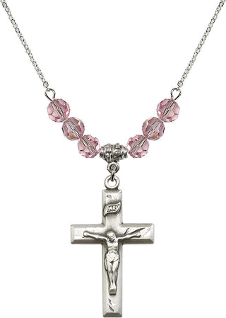 18" Rhodium Plated Necklace with 4mm Light Rose Crystal Beads featuring a Sterling Silver Crucifix Medal.