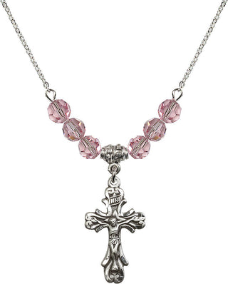 18" Rhodium Plated Necklace with 4mm Light Rose Crystal Beads featuring a Sterling Silver Crucifix Medal.