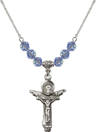 18" Rhodium Plated Necklace with 4mm Light Sapphire Crystal Beads featuring a Sterling Silver Trinity Crucifix Medal.