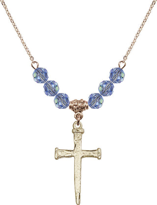 18" Hamilton Gold Plated Necklace with 4mm Light Sapphire Crystal Beads featuring a 14kt Gold Filled Nail Cross Medal.