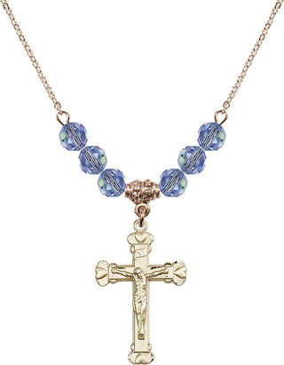 18" Hamilton Gold Plated Necklace with 4mm Light Sapphire Crystal Beads featuring a 14kt Gold Filled Crucifix Medal.