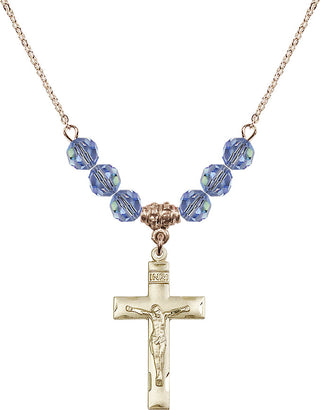 18" Hamilton Gold Plated Necklace with 4mm Light Sapphire Crystal Beads featuring a 14kt Gold Filled Crucifix Medal.