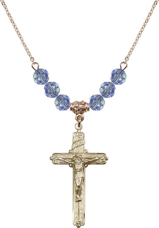 18" Hamilton Gold Plated Necklace with 4mm Light Sapphire Crystal Beads featuring a 14kt Gold Filled Crucifix Medal.