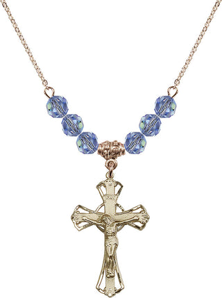 18" Hamilton Gold Plated Necklace with 4mm Light Sapphire Crystal Beads featuring a 14kt Gold Filled Crucifix Medal.
