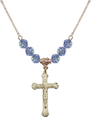 18" Hamilton Gold Plated Necklace with 4mm Light Sapphire Crystal Beads featuring a 14kt Gold Filled Crucifix Medal.