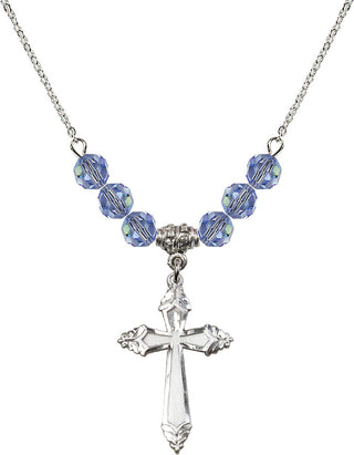 18" Rhodium Plated Necklace with 4mm Light Sapphire Crystal Beads featuring a Sterling Silver Cross Medal.