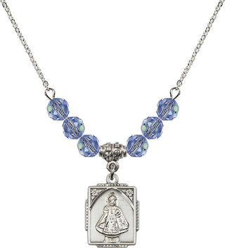 18" Rhodium Plated Necklace with 4mm Light Sapphire Crystal Beads featuring a Sterling Silver Infant of Prague Medal. Engraved Catholic Saint Jewelry