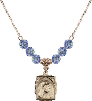 18" Hamilton Gold Plated Necklace with 4mm Light Sapphire Crystal Beads featuring a 14kt Gold Filled Saint Teresa of Calcutta Medal. Engraved Catholic Saint Jewelry