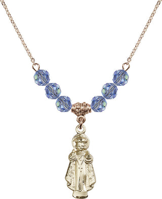 18" Hamilton Gold Plated Necklace with 4mm Light Sapphire Crystal Beads featuring a 14kt Gold Filled Infant of Prague Medal.