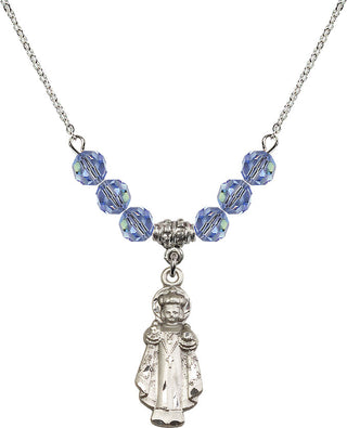18" Rhodium Plated Necklace with 4mm Light Sapphire Crystal Beads featuring a Sterling Silver Infant of Prague Medal.