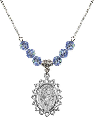 18" Rhodium Plated Necklace with 4mm Light Sapphire Crystal Beads featuring a Sterling Silver Our Lady of Guadalupe Medal.
