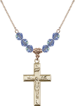 18" Hamilton Gold Plated Necklace with 4mm Light Sapphire Crystal Beads featuring a 14kt Gold Filled Crucifix Medal.