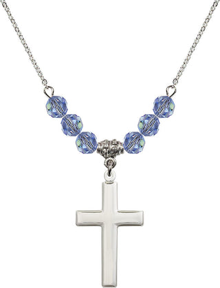 18" Rhodium Plated Necklace with 4mm Light Sapphire Crystal Beads featuring a Sterling Silver Cross Medal.