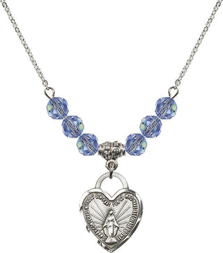 18" Rhodium Plated Necklace with 4mm Light Sapphire Crystal Beads featuring a Sterling Silver Miraculous Heart Medal. Engraved Catholic Saint Jewelry