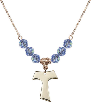 18" Hamilton Gold Plated Necklace with 4mm Light Sapphire Crystal Beads featuring a 14kt Gold Filled Tau Cross Medal.