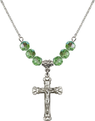 18" Rhodium Plated Necklace with 4mm Peridot Crystal Beads featuring a Sterling Silver Crucifix Medal.