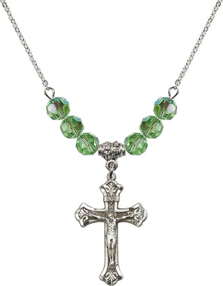 18" Rhodium Plated Necklace with 4mm Peridot Crystal Beads featuring a Sterling Silver Crucifix Medal.