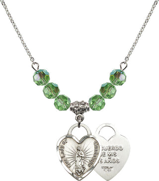 18" Rhodium Plated Necklace with 4mm Peridot Crystal Beads featuring a Sterling Silver Our Lady Guadalupe Heart / Recuerdo Medal.