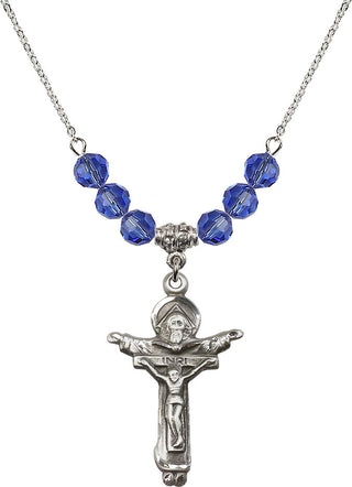 18" Rhodium Plated Necklace with 4mm Sapphire Crystal Beads featuring a Sterling Silver Trinity Crucifix Medal.