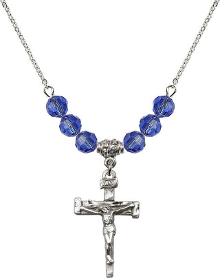 18" Rhodium Plated Necklace with 4mm Sapphire Crystal Beads featuring a Sterling Silver Nail Crucifix Medal.