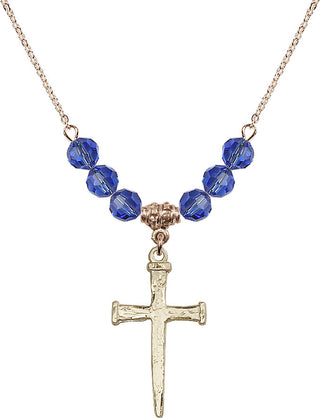 18" Hamilton Gold Plated Necklace with 4mm Sapphire Crystal Beads featuring a 14kt Gold Filled Nail Cross Medal.