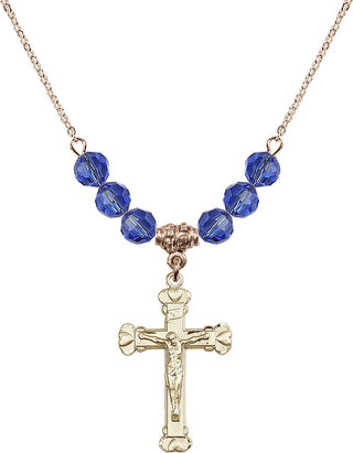 18" Hamilton Gold Plated Necklace with 4mm Sapphire Crystal Beads featuring a 14kt Gold Filled Crucifix Medal.