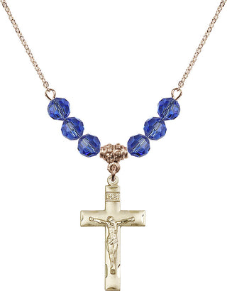 18" Hamilton Gold Plated Necklace with 4mm Sapphire Crystal Beads featuring a 14kt Gold Filled Crucifix Medal.