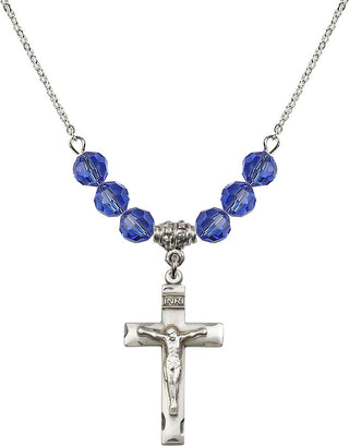 18" Rhodium Plated Necklace with 4mm Sapphire Crystal Beads featuring a Sterling Silver Crucifix Medal.