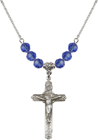18" Rhodium Plated Necklace with 4mm Sapphire Crystal Beads featuring a Sterling Silver Crucifix Medal.