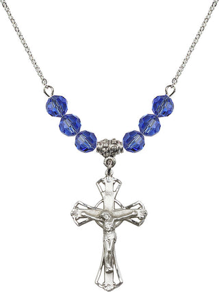 18" Rhodium Plated Necklace with 4mm Sapphire Crystal Beads featuring a Sterling Silver Crucifix Medal.