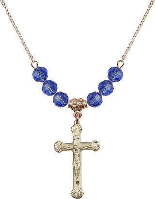 18" Hamilton Gold Plated Necklace with 4mm Sapphire Crystal Beads featuring a 14kt Gold Filled Crucifix Medal.