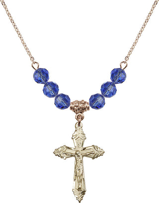 18" Hamilton Gold Plated Necklace with 4mm Sapphire Crystal Beads featuring a 14kt Gold Filled Crucifix Medal.