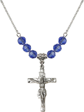 18" Rhodium Plated Necklace with 4mm Sapphire Crystal Beads featuring a Sterling Silver Crucifix Medal.