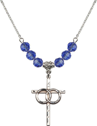 18" Rhodium Plated Necklace with 4mm Sapphire Crystal Beads featuring a Sterling Silver Wedding Rings Cross Medal.
