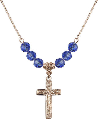 18" Hamilton Gold Plated Necklace with 4mm Sapphire Crystal Beads featuring a 14kt Gold Filled Crucifix Medal.