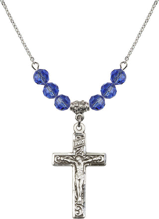 18" Rhodium Plated Necklace with 4mm Sapphire Crystal Beads featuring a Sterling Silver Crucifix Medal.