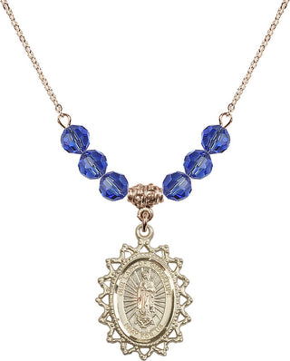18" Hamilton Gold Plated Necklace with 4mm Sapphire Crystal Beads featuring a 14kt Gold Filled Our Lady of Guadalupe Medal.